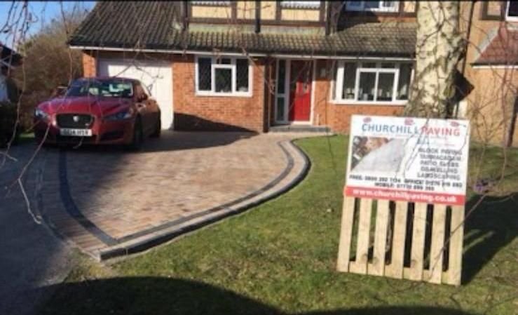 Buff block paving driveway