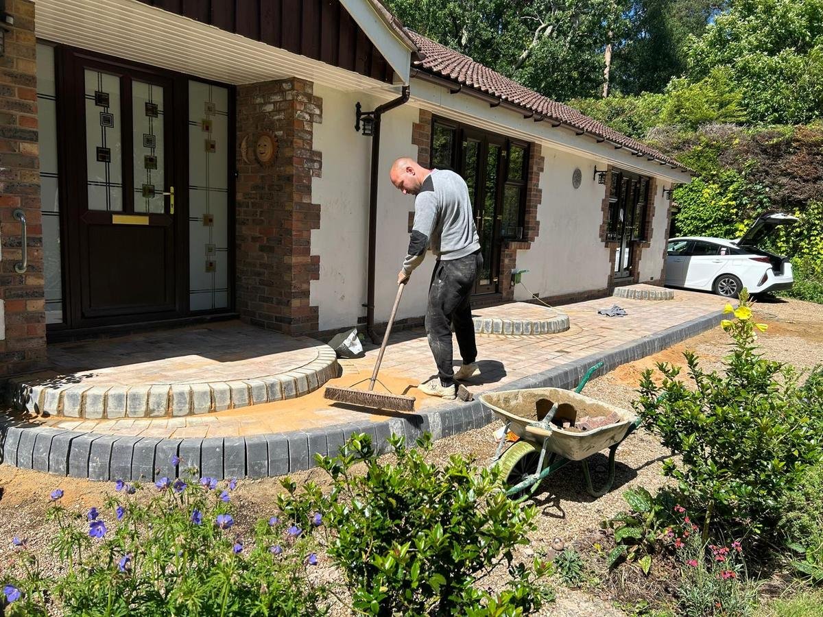 Churchill Paving team laying a patio on site