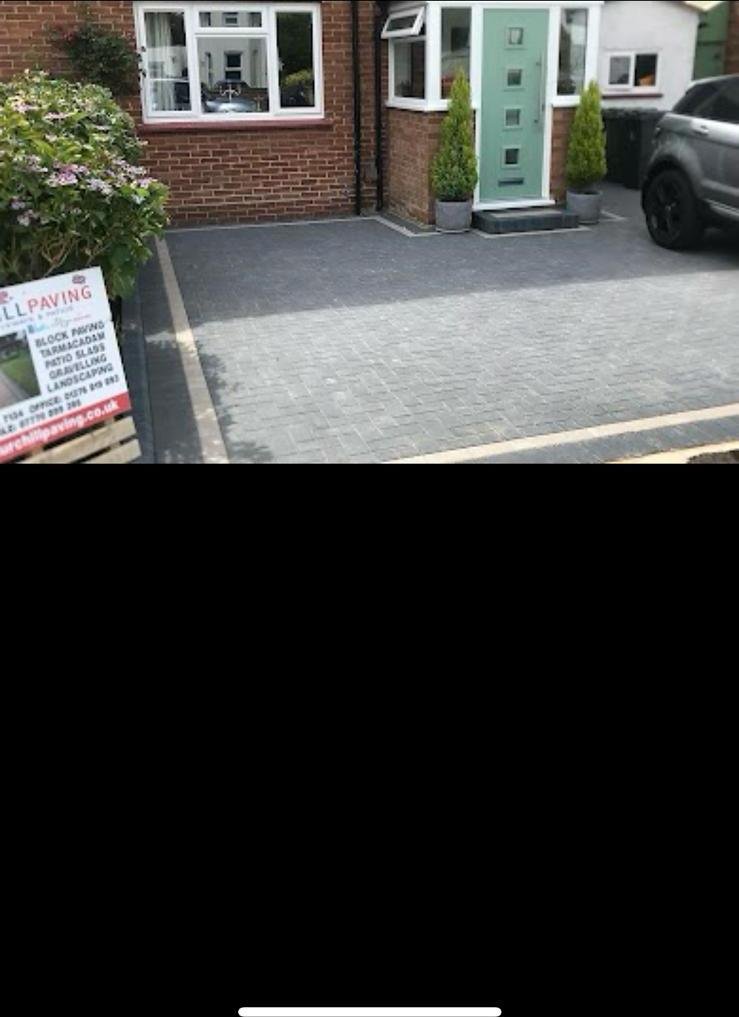 Patio steps with sleeper edging and pebble borders, Churchill Paving